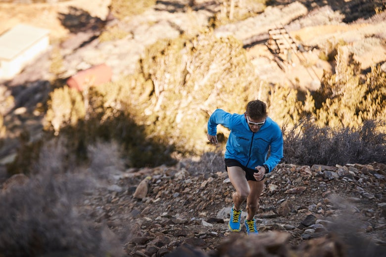 Tim running up a mountain